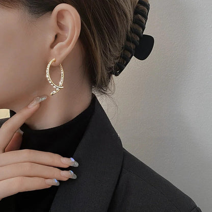 EarGlow™ – Eye-Catching Statement Hoop Earrings [50% Off]