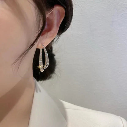 EarGlow™ – Eye-Catching Statement Hoop Earrings [50% Off]